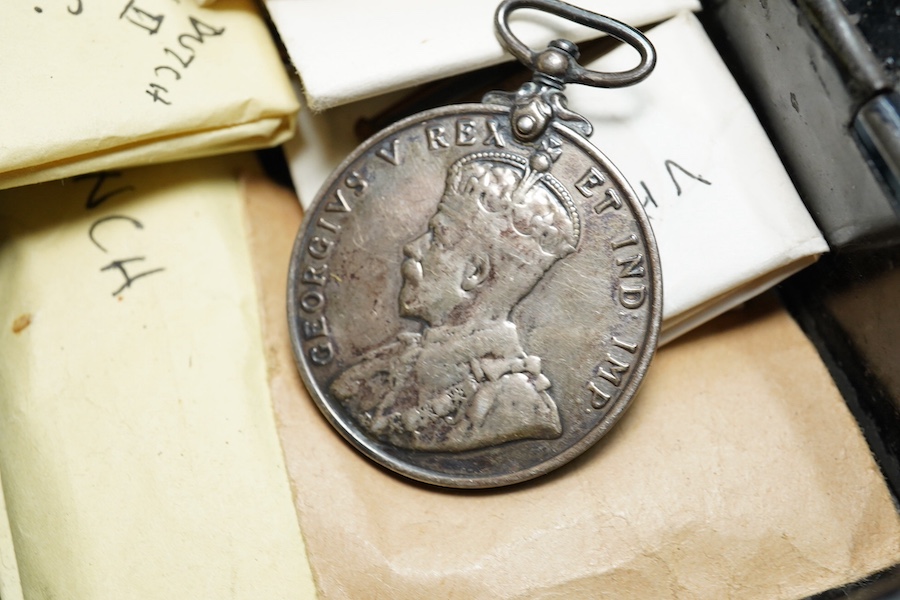 A mixed group of coins and commemorative medals